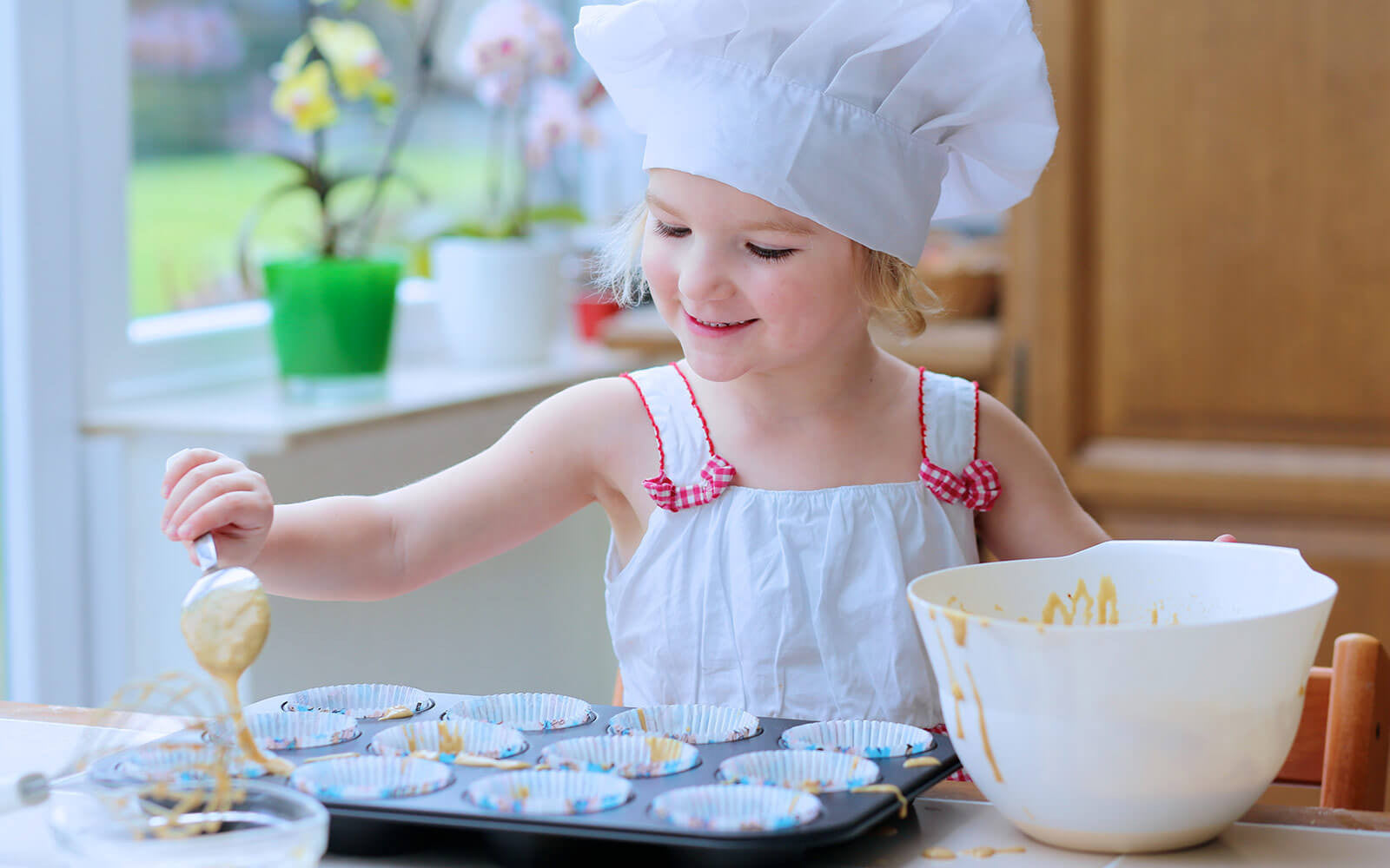 Kids love to bake cupcakes at home